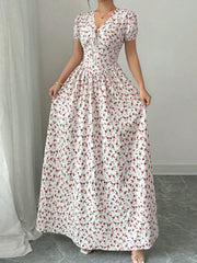 Maxi dress with V-neck, short sleeves, and a white floral print.