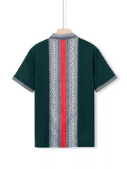 Dark green men's short sleeve shirt with bold geometric print panel and red stripe detail.