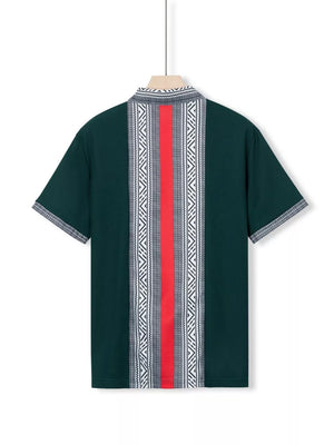 Dark green men's short sleeve shirt with bold geometric print panel and red stripe detail.