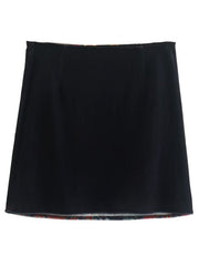 Black velvet mini skirt with embroidered patchwork trim