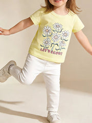 Yellow cotton t-shirt with daisy graphic and LET'S GROW text for kids