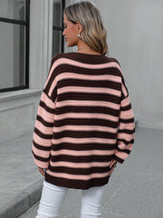 Chunky stripe relaxed fit knit sweater in brown and pink acrylic with crew neck.