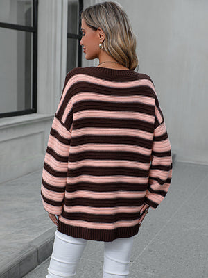 Chunky stripe relaxed fit knit sweater in brown and pink acrylic with crew neck.