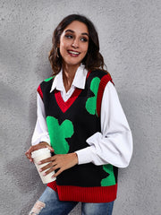Black acrylic knit vest with clover intarsia pattern and red trim.