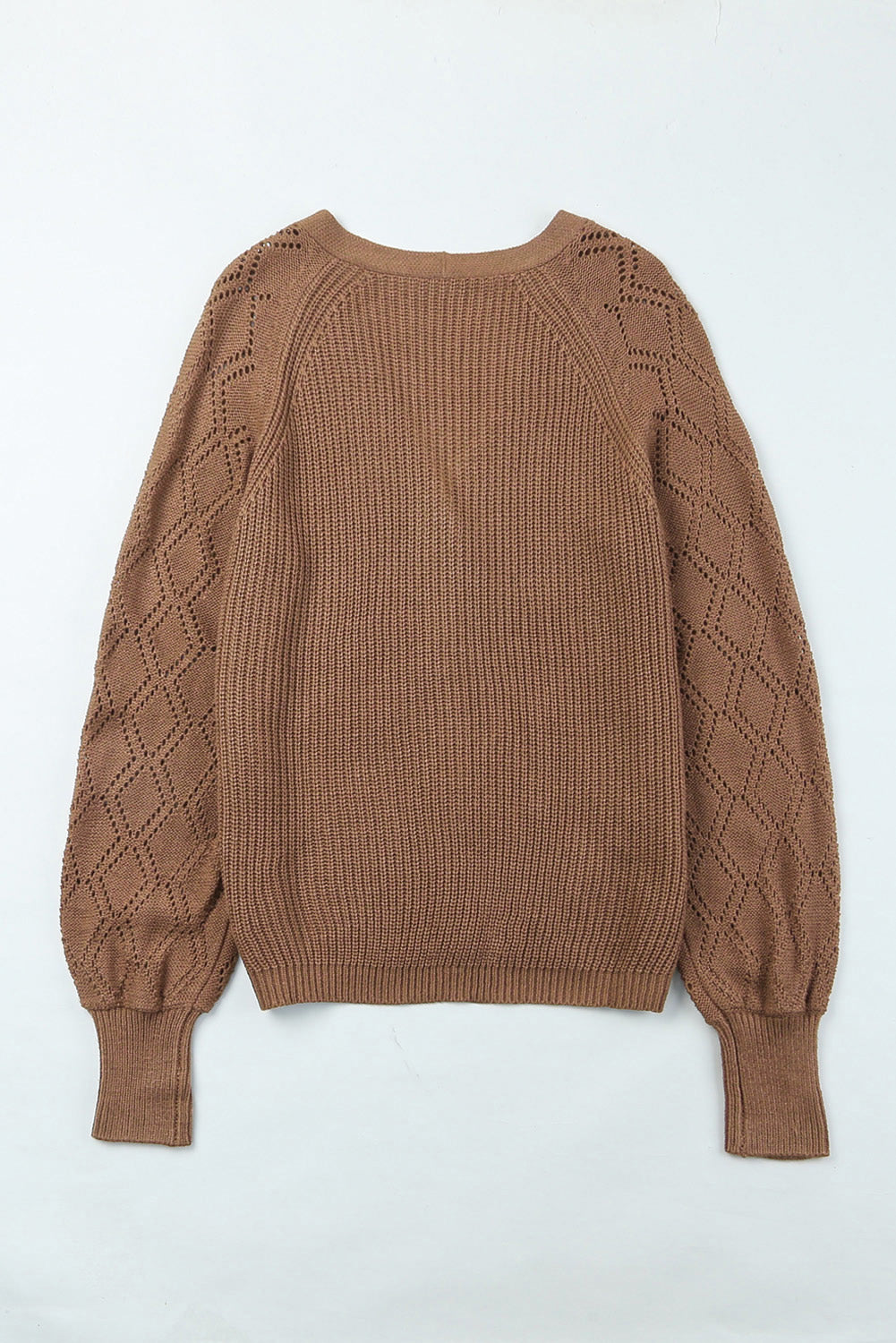 Taupe acrylic knit cardigan with diamond-cut sleeves and ribbed cuffs.