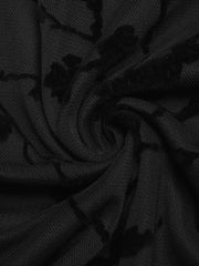 Black maternity t-shirt with velvet floral burnout pattern and mandarin collar detail.