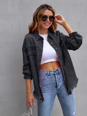 Gray distressed denim shacket with frayed hem and cuffs, button front, and chest pockets.