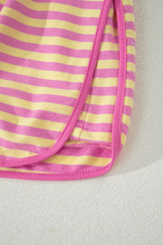 Cotton two-piece set with pink and yellow horizontal stripes and pink trim detail.