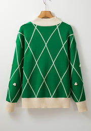 Dark green argyle knit sweater with mock neck and pearl embellishments.