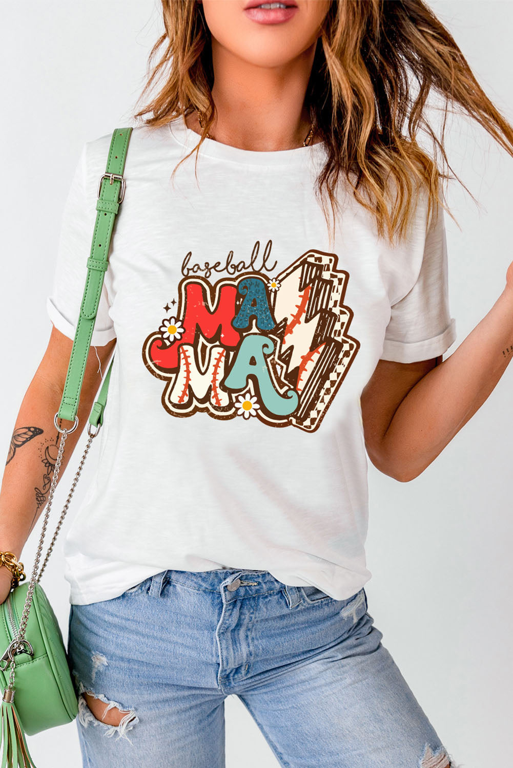 White graphic tee with baseball mama text and baseball graphics