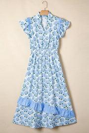 Blue hydrangea print midi dress with flutter sleeves, smocked waist, and ruffled tiers.