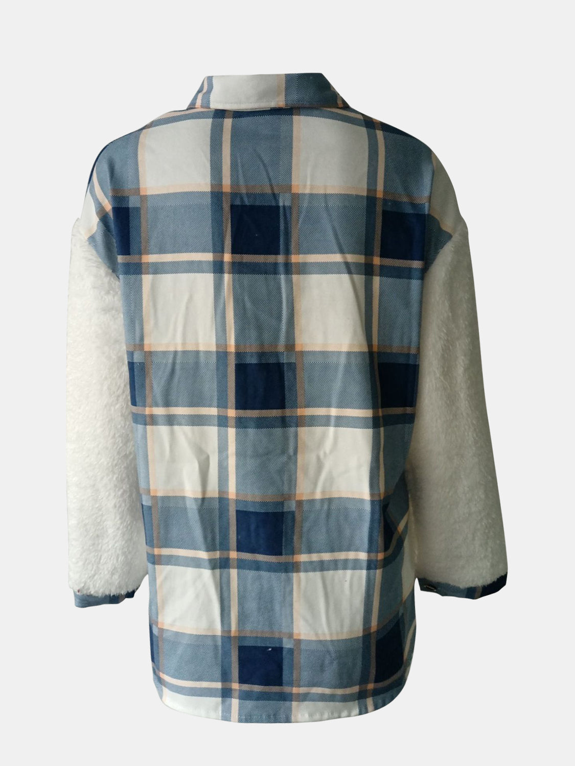 Plaid shacket with sherpa sleeves in Dusty Blue and white plaid pattern.