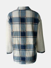 Plaid shacket with sherpa sleeves in Dusty Blue and white plaid pattern.