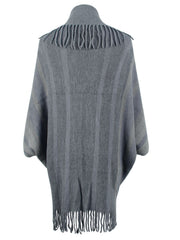 Charcoal knit capelet with fringe detail and striped pattern.