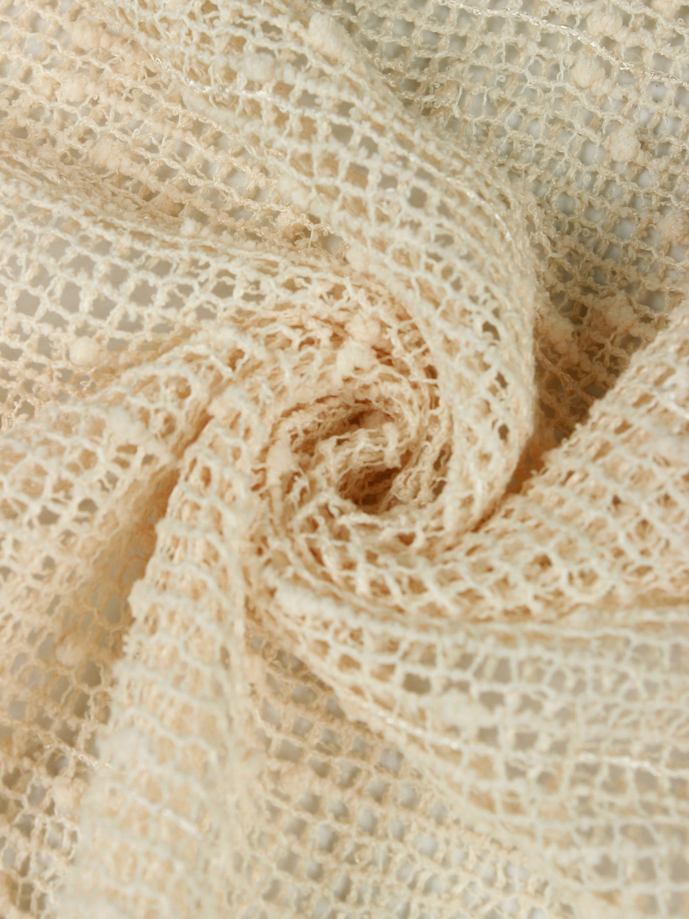 Openwork halter neck cover-up dress in cream knit with textured details.