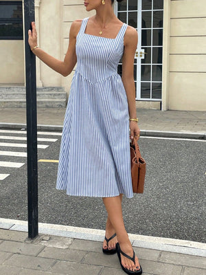 Blue and white striped midi dress with square neckline and a-line skirt.