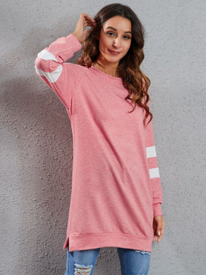 Pink sweatshirt dress with white varsity stripes on sleeves, crew neck, long sleeves, polyester