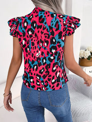 Hot pink leopard print blouse with ruffled sleeves and a pussybow detail.