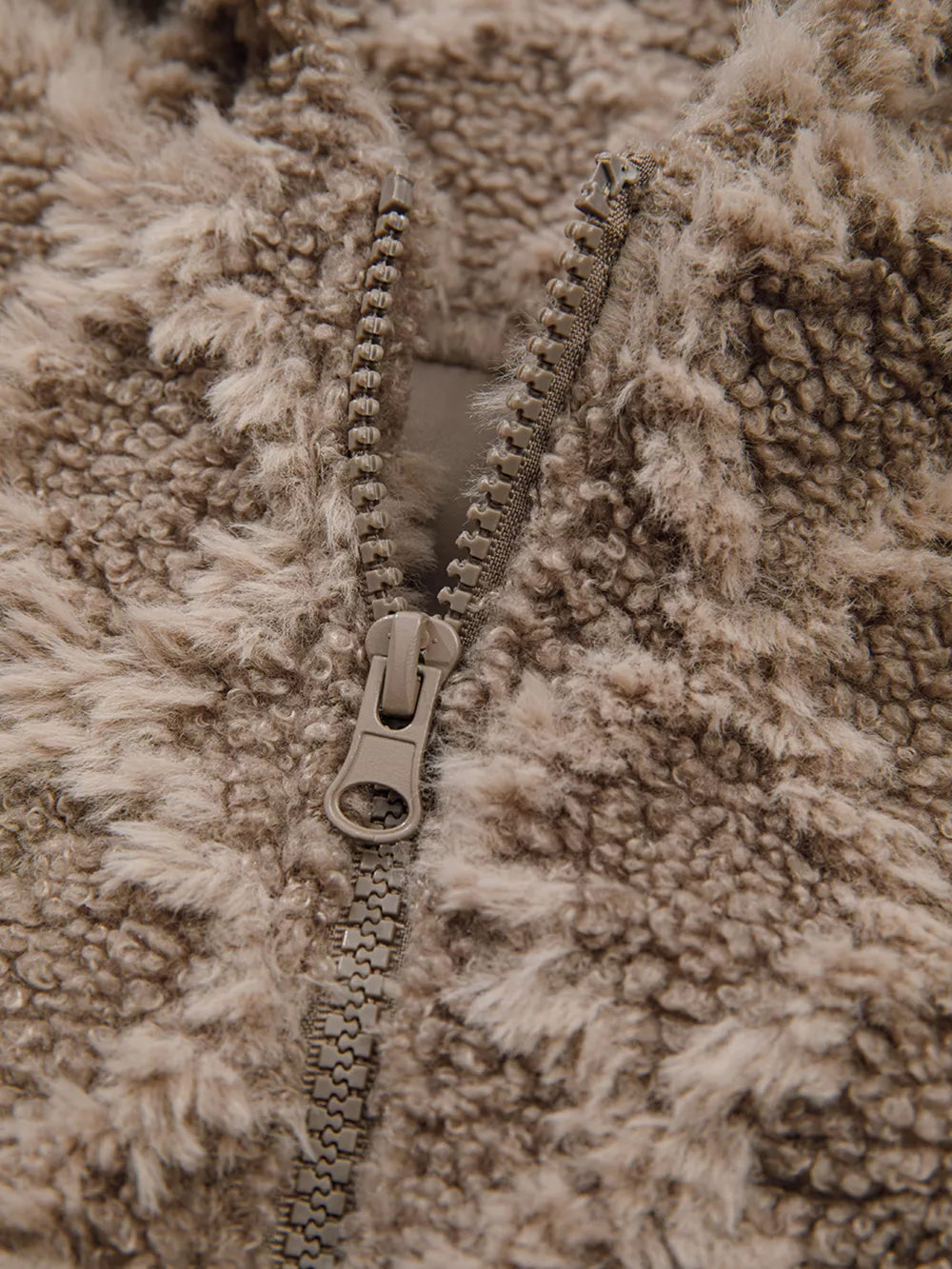 Textured sherpa fleece hooded jacket in taupe with a full zip closure.