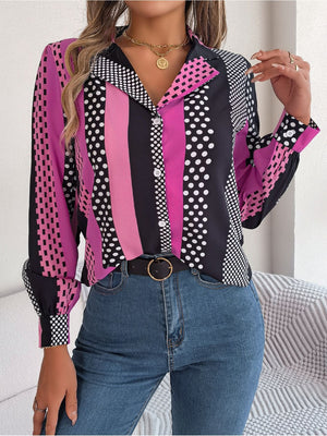 Collared blouse with bold pink, black, and white geometric and polka dot print.
