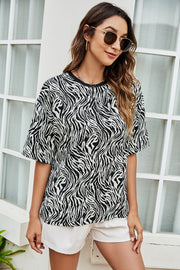 Black and white zebra print boxy tee with short sleeves and a crew neck.