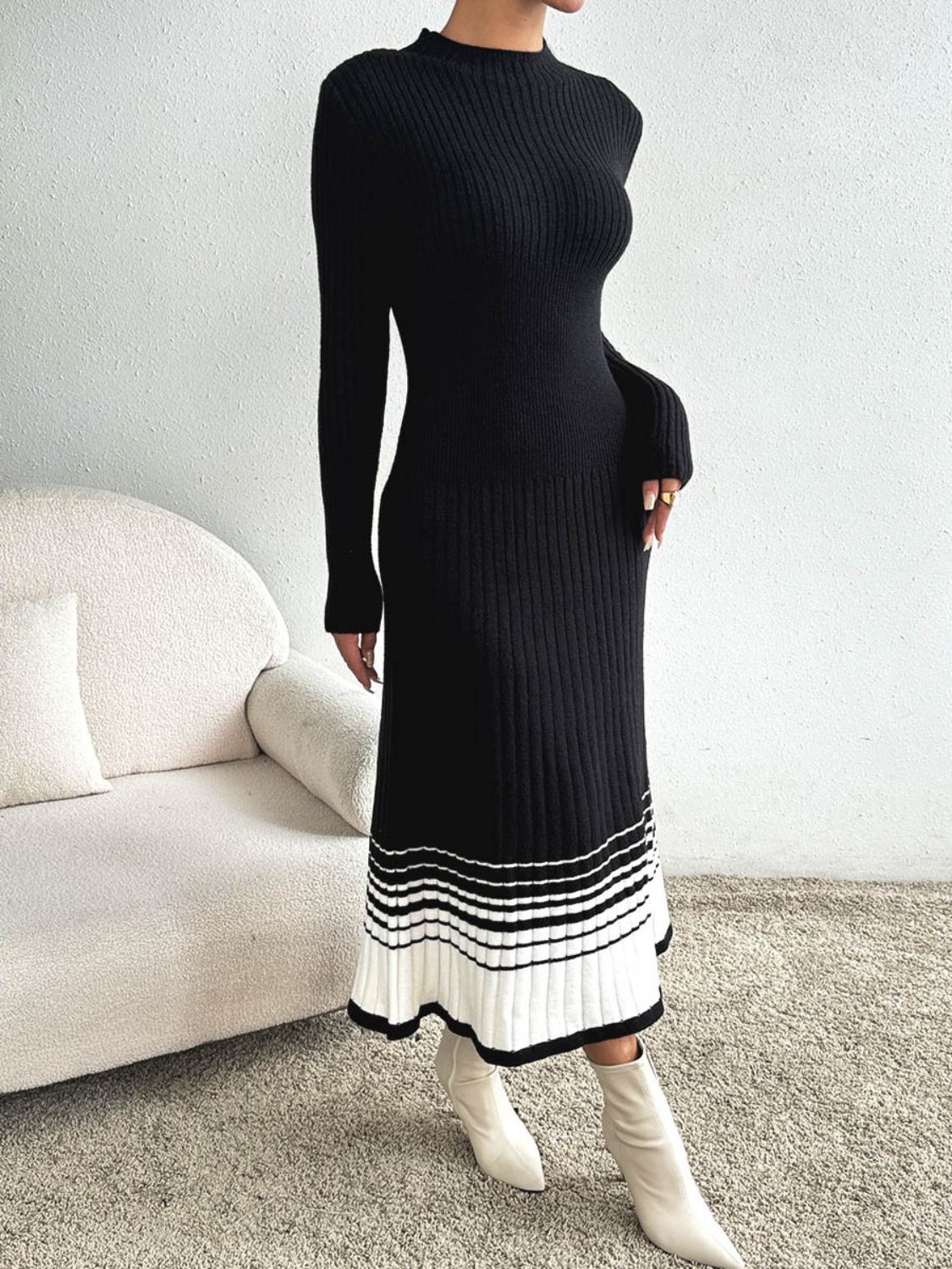 Black ribbed knit midi dress with contrast striped hem