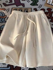 Men's Apricot waffle knit drawstring boxer shorts with pockets.