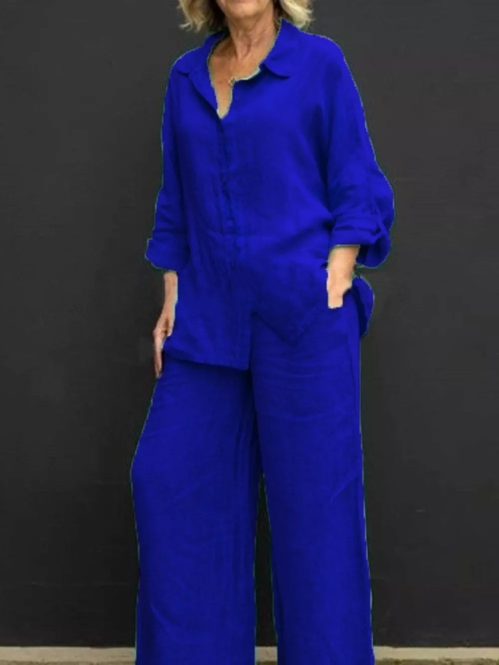 Royal blue button-down collared two-piece set with wide-leg pants and a relaxed fit top.