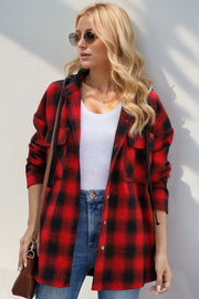 Oversized red and black plaid hooded shirt jacket with buttoned front and chest pockets.