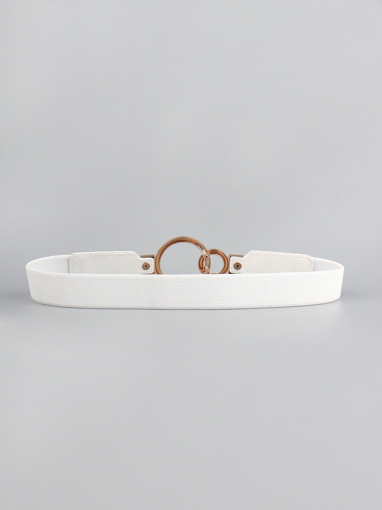White elastic belt with interlocked gold rings and gold buckle detail