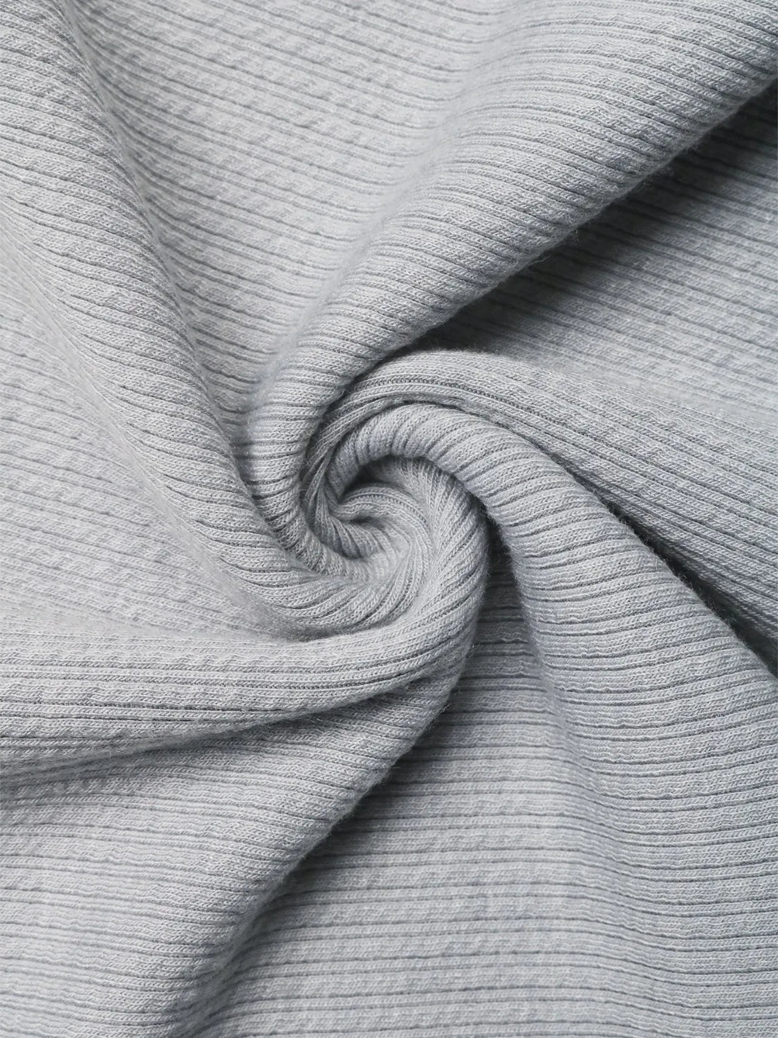 Gray ribbed fabric detail of a cami top with asymmetric bow strap