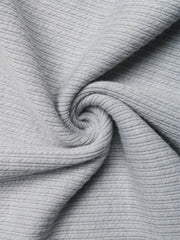 Gray ribbed fabric detail of a cami top with asymmetric bow strap