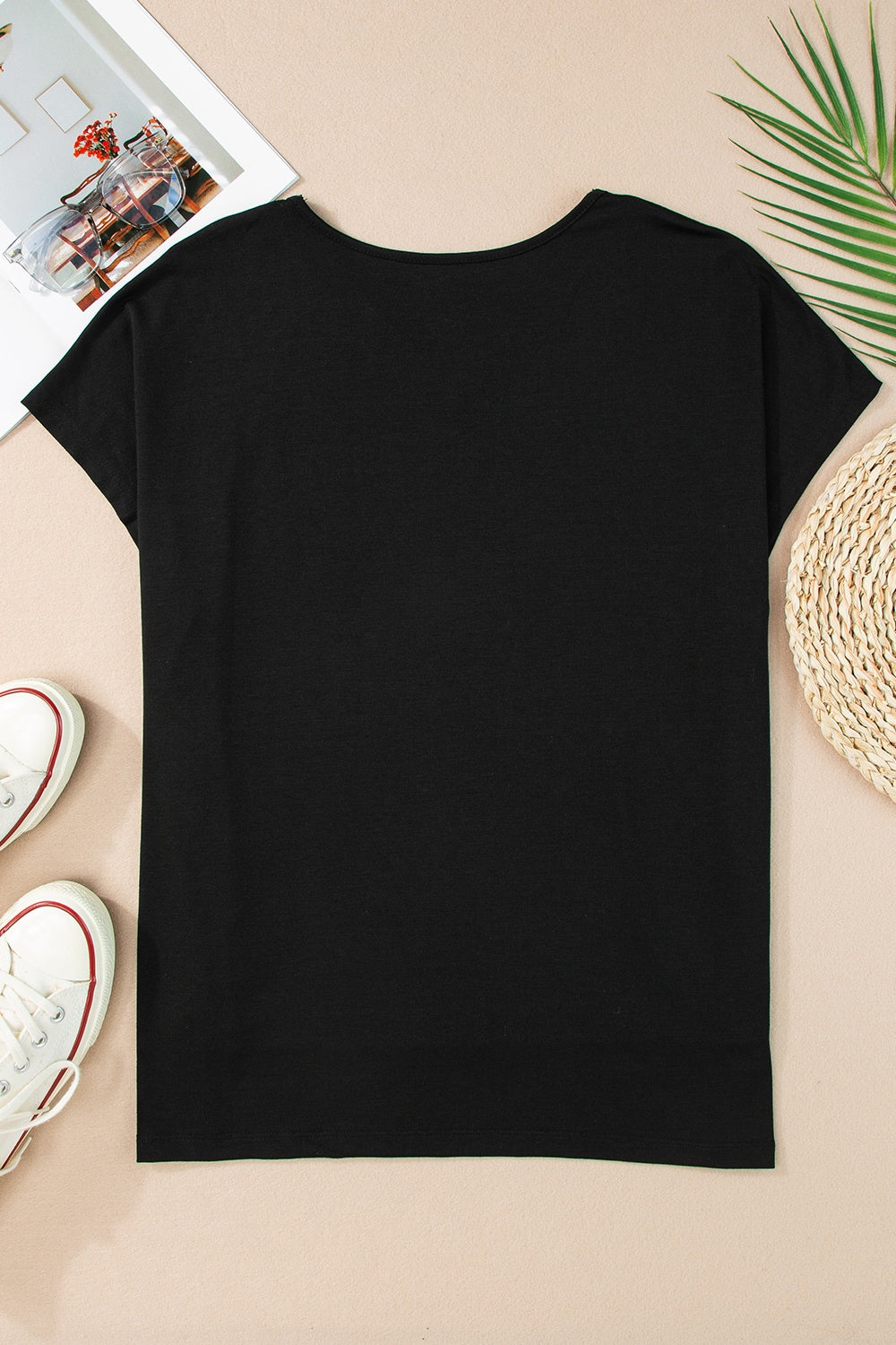 Black dolman sleeve blouse with perforated trim detail