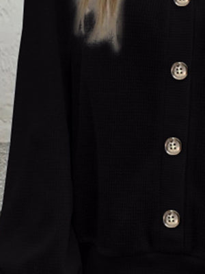 Black waffle knit button-down cardigan with silver buttons