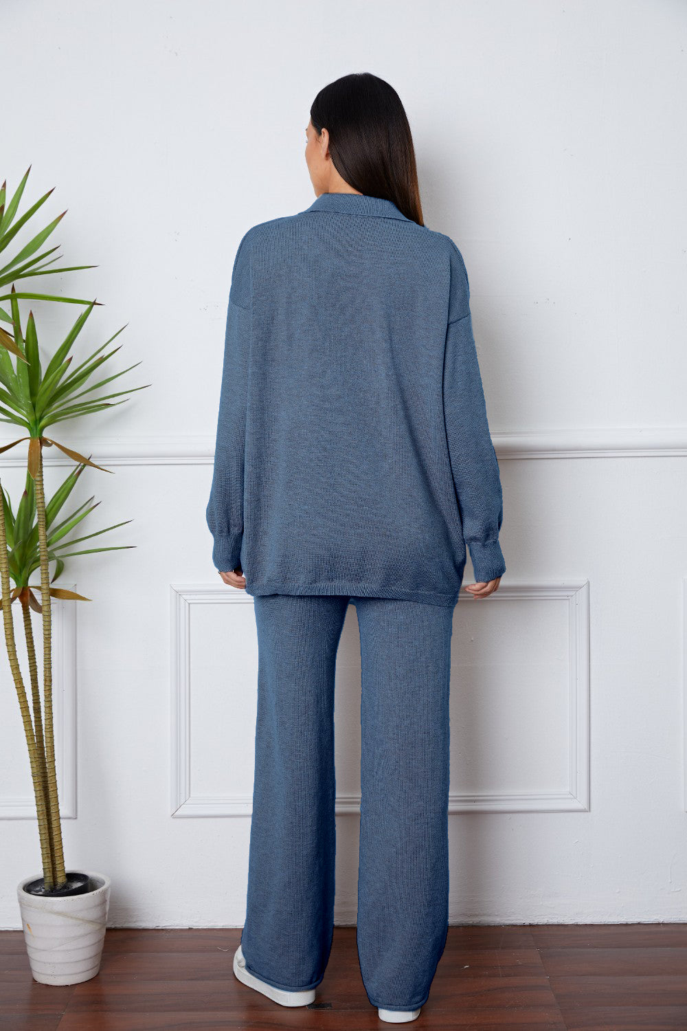 Relaxed knit polo co-ord set in French Blue, featuring a collared long sleeve top and wide leg pants.