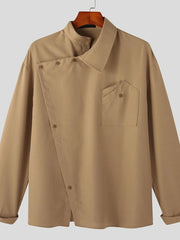 Camel long sleeve shirt with asymmetrical button-up and architectural collar.