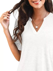 White puff sleeve t-shirt with notched V-neck and short sleeves.