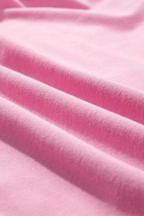 Pink cotton co-ord set with ruffled neckline detail