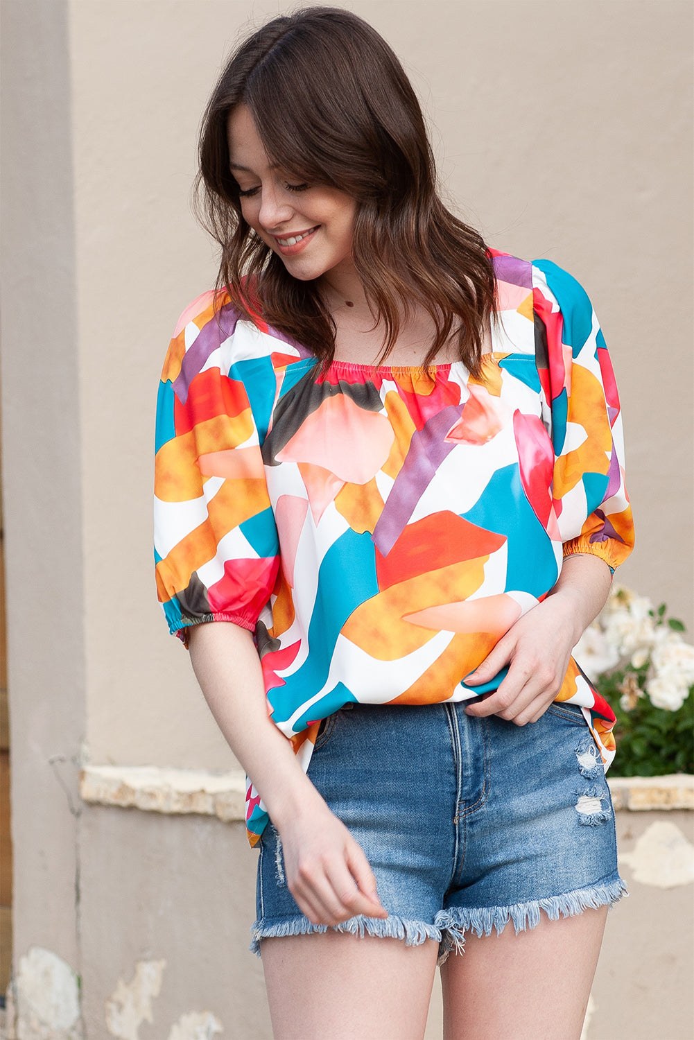 Abstract print puff sleeve blouse with a square neckline in multicolor.