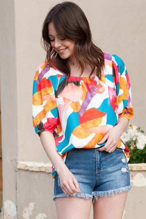 Abstract print puff sleeve blouse with a square neckline in multicolor.