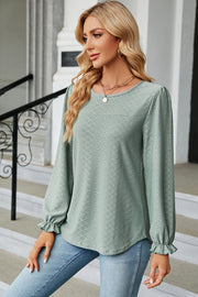 Light Green textured puff sleeve blouse with ruffled cuffs