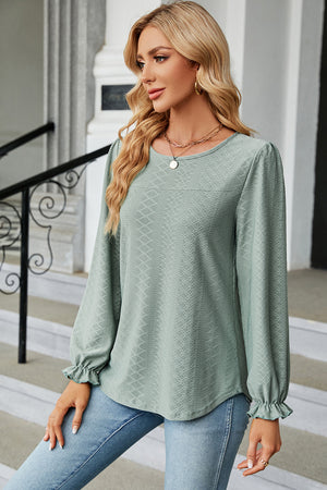 Light Green textured puff sleeve blouse with ruffled cuffs