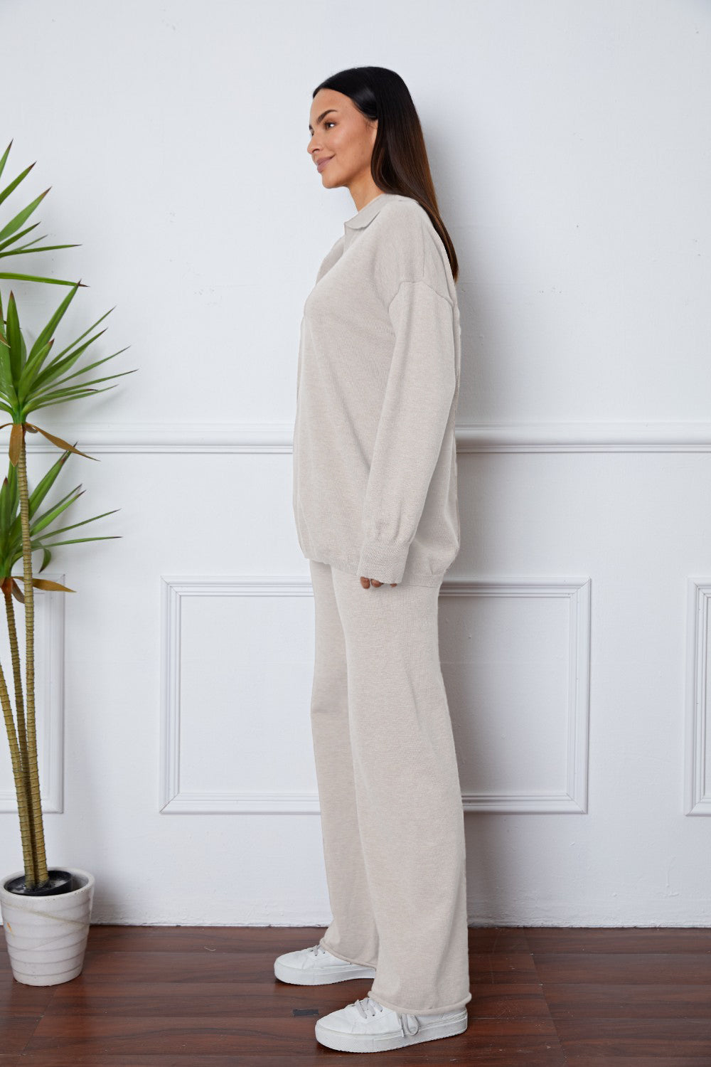 Relaxed knit polo co-ord set in ivory with wide leg pants and collared long sleeve top.
