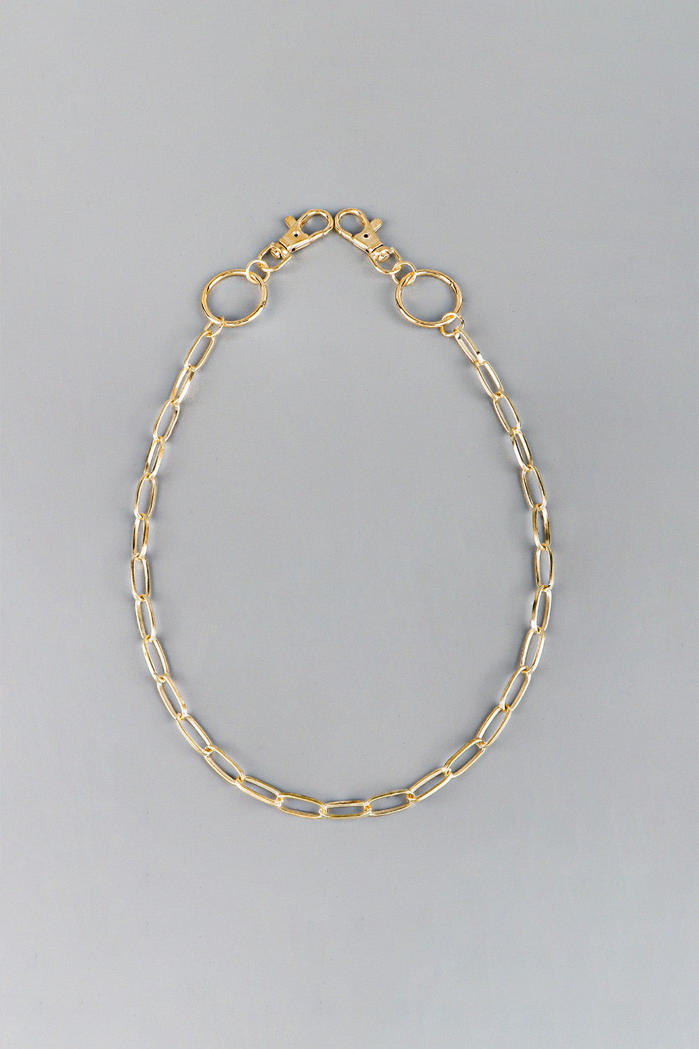 Gold chain wallet chain with lobster clasps and O-ring connectors for belts and pants.