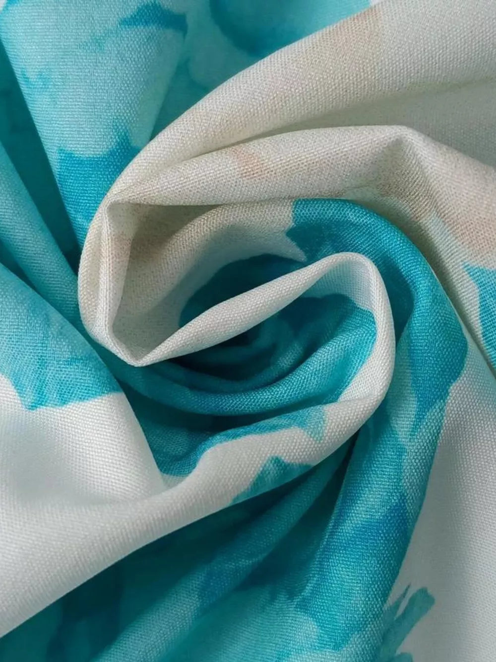 Teal floral print maxi dress fabric detail with V-neck and ruffle sleeve style
