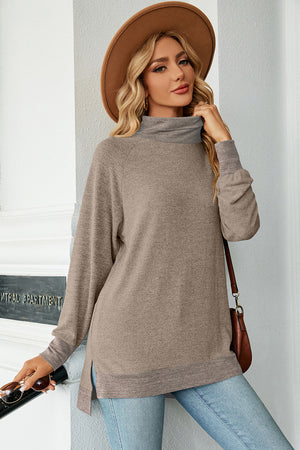 Colorblock raglan turtleneck tunic in mocha with gray accents and side slits.