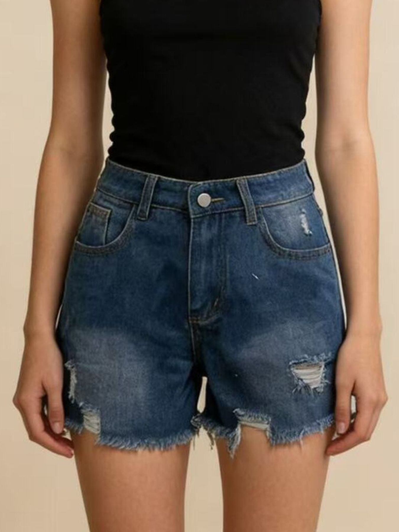 Dark blue denim shorts with distressed details and frayed hem.