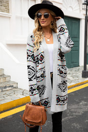 Geometric knit open cardigan in light gray with black and colorful Aztec pattern, pockets.