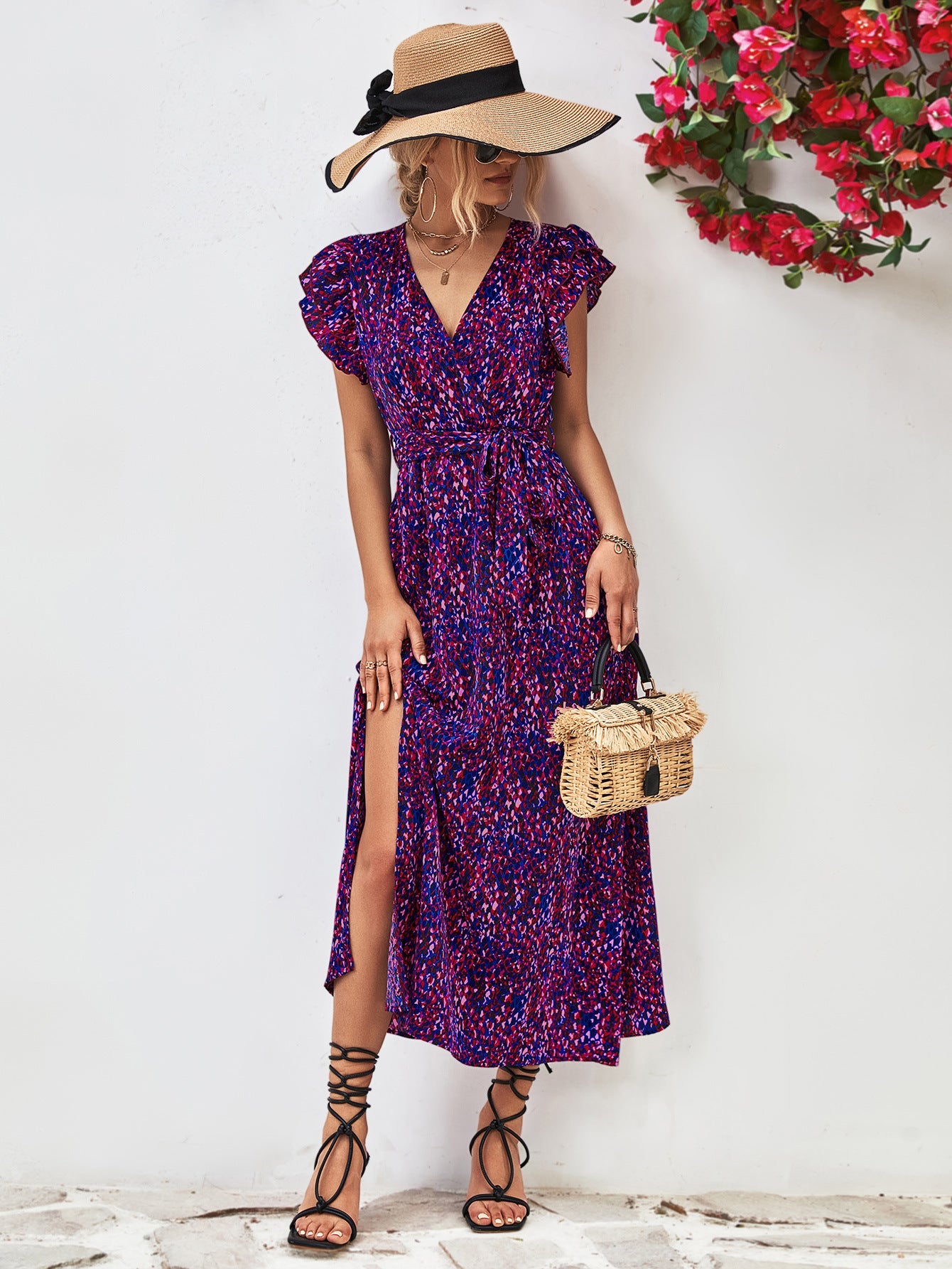 Blue purple floral wrap midi dress with flutter sleeves and a belted waist.