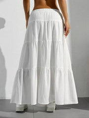 White tiered maxi skirt with elastic waistband and subtle vertical texture